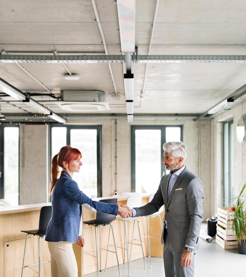 two-business-people-in-the-office-shaking-hands-PWRS4YC.jpg two-business-people-in-the-office-shaking-hands-PWRS4YC.jpg